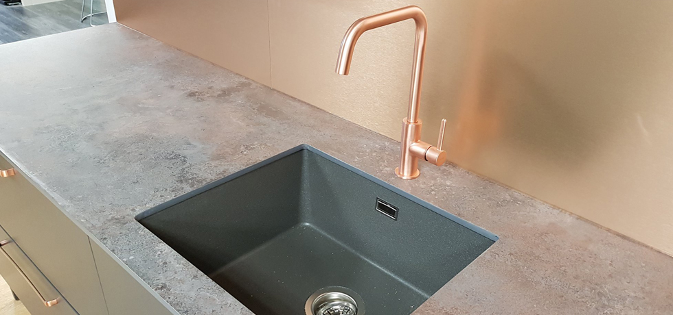 Evolve Caldeira on display at Homecare Supplies, with Brushed Copper splashback 